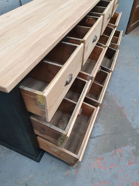 Old craft furniture with drawers façade and oak top