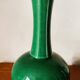 Green ceramic baluster vase