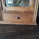 Old glass wall shelf with drawer door