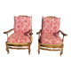 pair of rustic wood and fabric armchairs