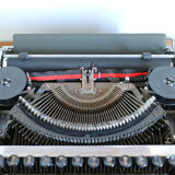 Japy grey-green typewriter with crate