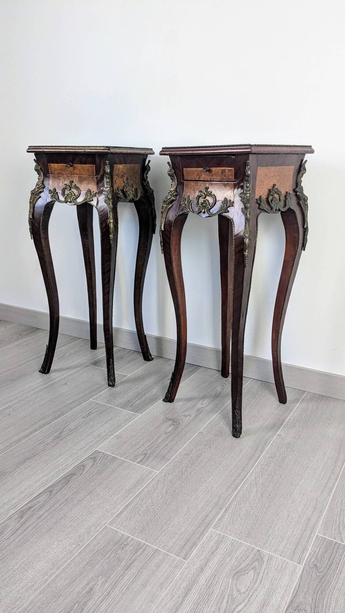 Pair of Louis XV bedside tables with marquetry and gilded bronzes