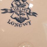 Suite of 7 Longwy hollow plates