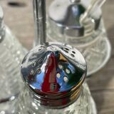 Silver-plated metal and glass salt and pepper shakers