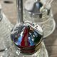 Silver-plated metal and glass salt and pepper shakers