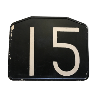 Old bakelite No. 15 bus line plate