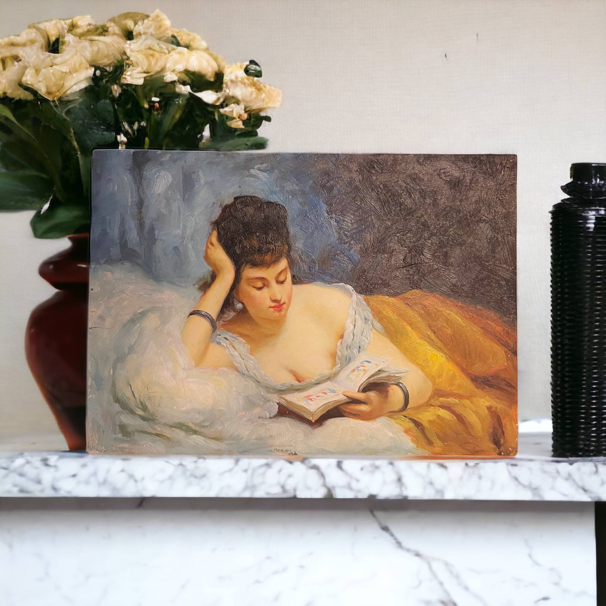 Young woman lying reading oil on panel