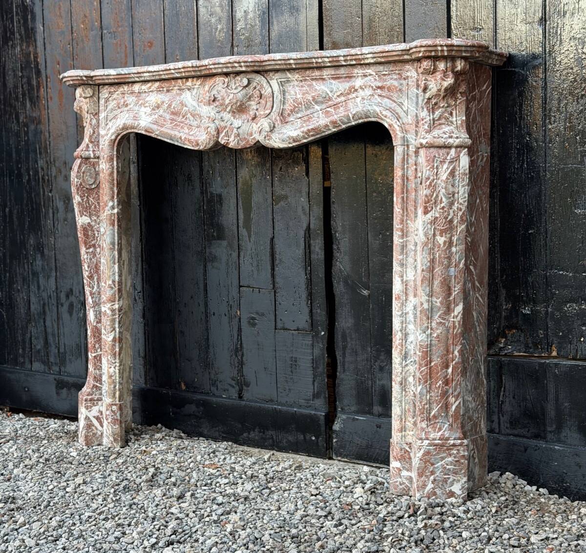 Louis XV style fireplace in grey Ardennes marble, circa 1880.