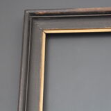 Large wooden black and gilded frame