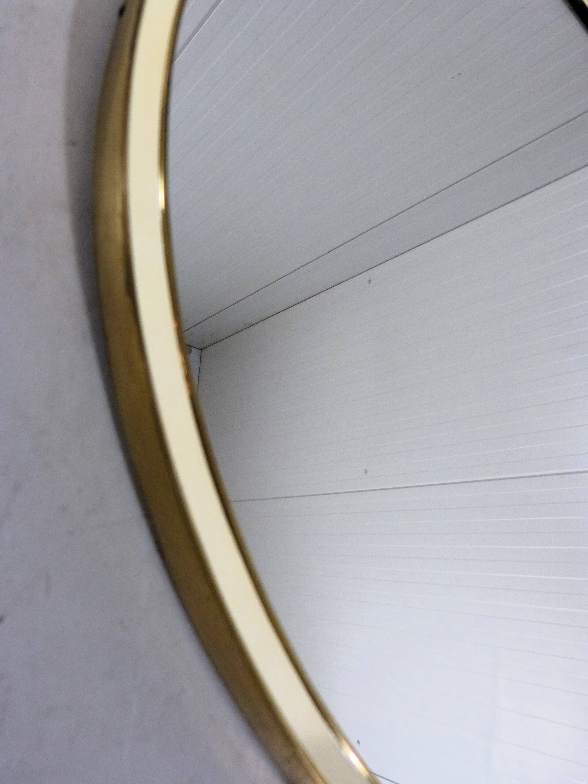Brass wall mirror by "Vereinigte Werkstatten München" 1950’s