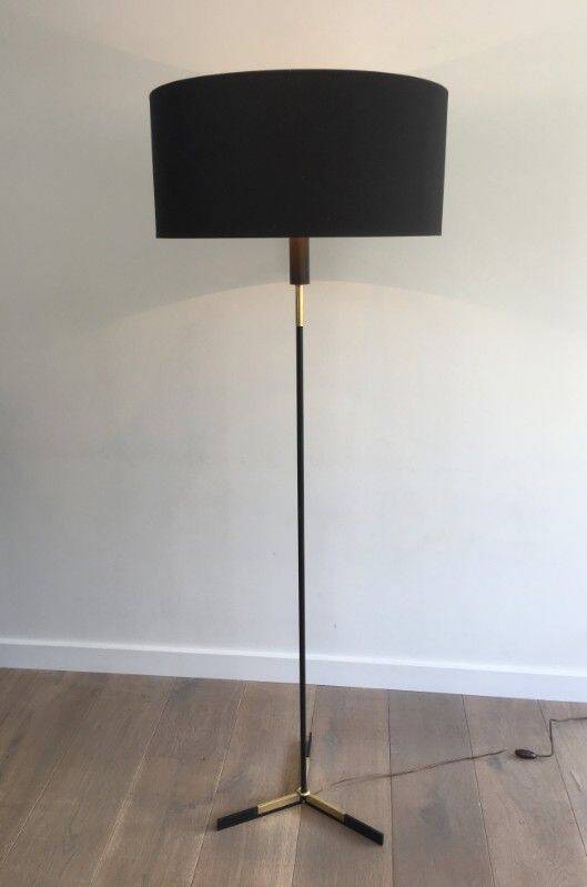 Designer floor lamp in black lacquered metal and brass