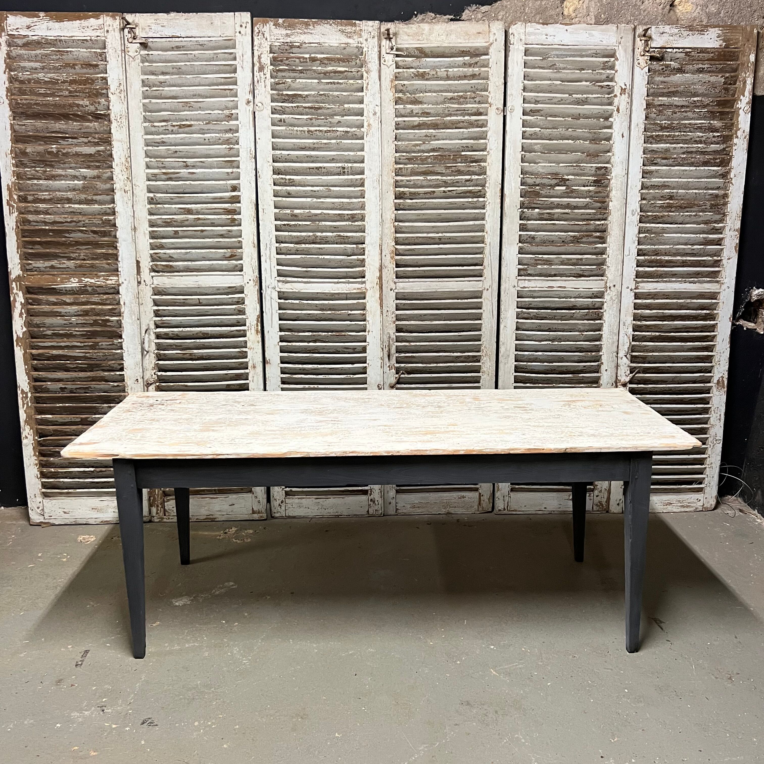 Black farmhouse table and white patinated top