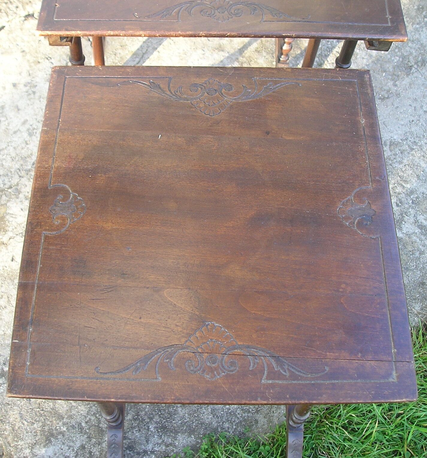 Set of 4 old tables with carved trays