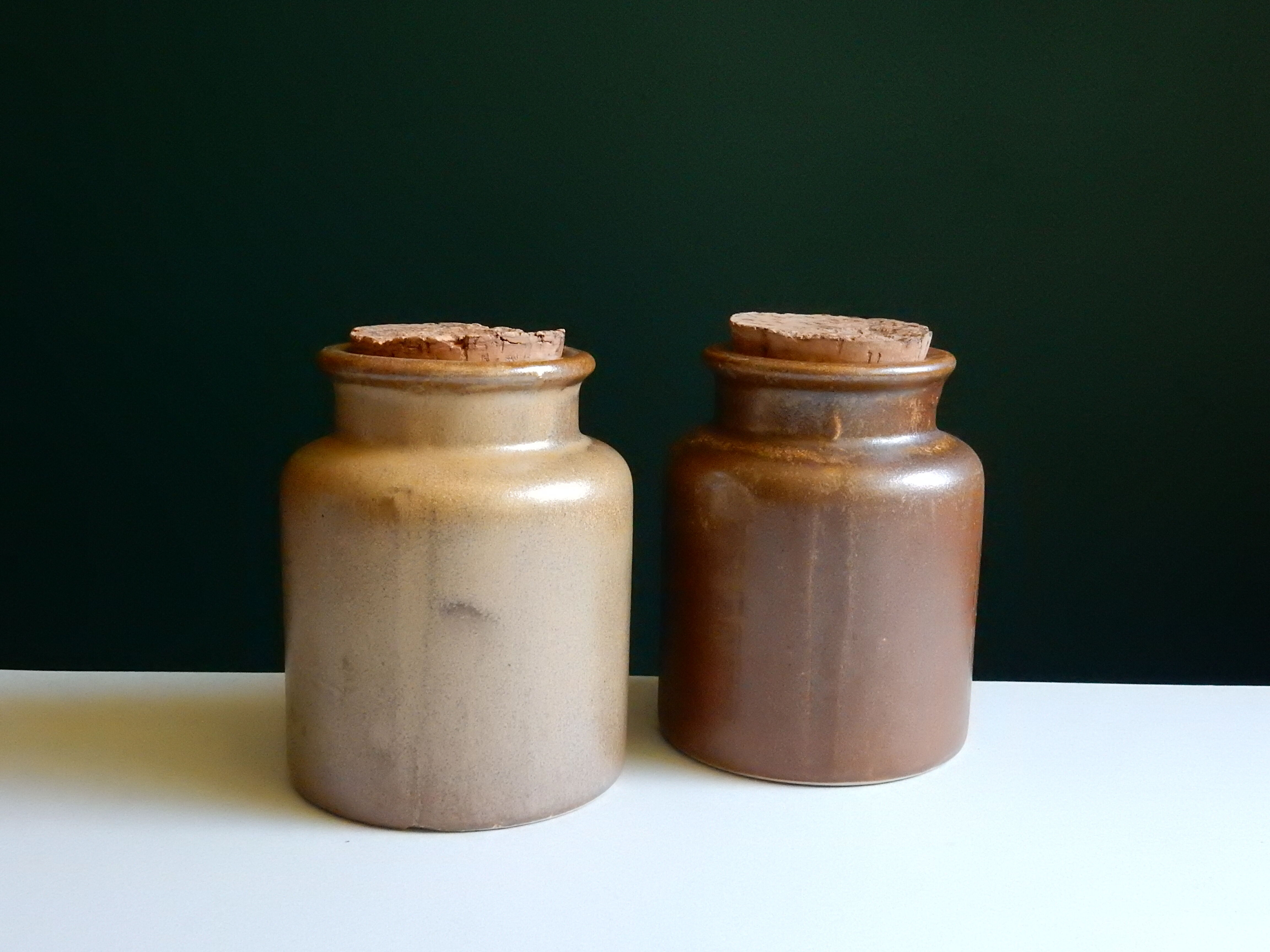 2 brown sandstone mustard pots