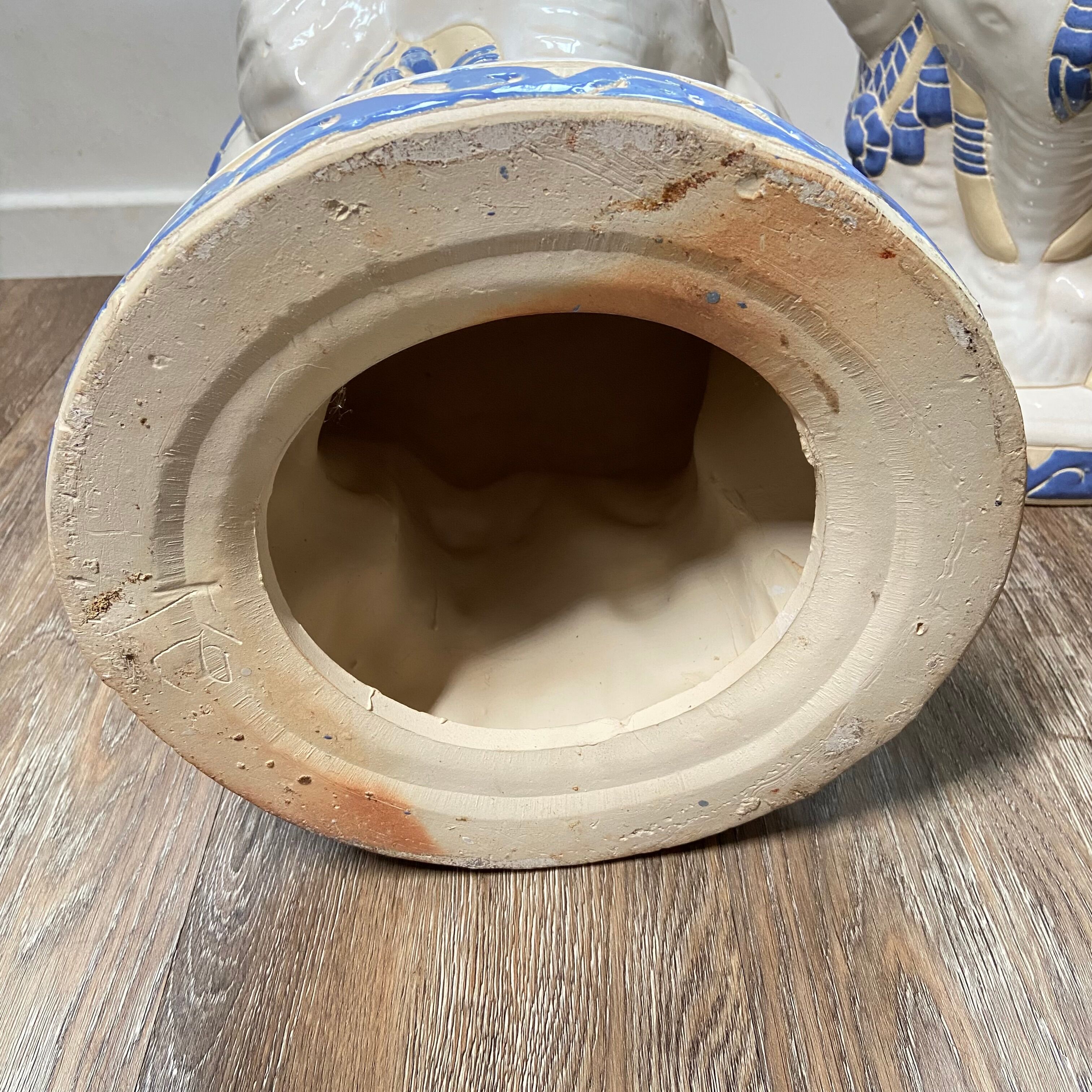 Pair of ceramic elephant stools