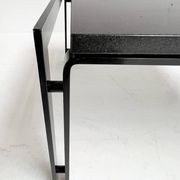 Black granite side table or coffee table from the 1980’s