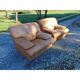 Paire de fauteuils vintage en skaï marron clair