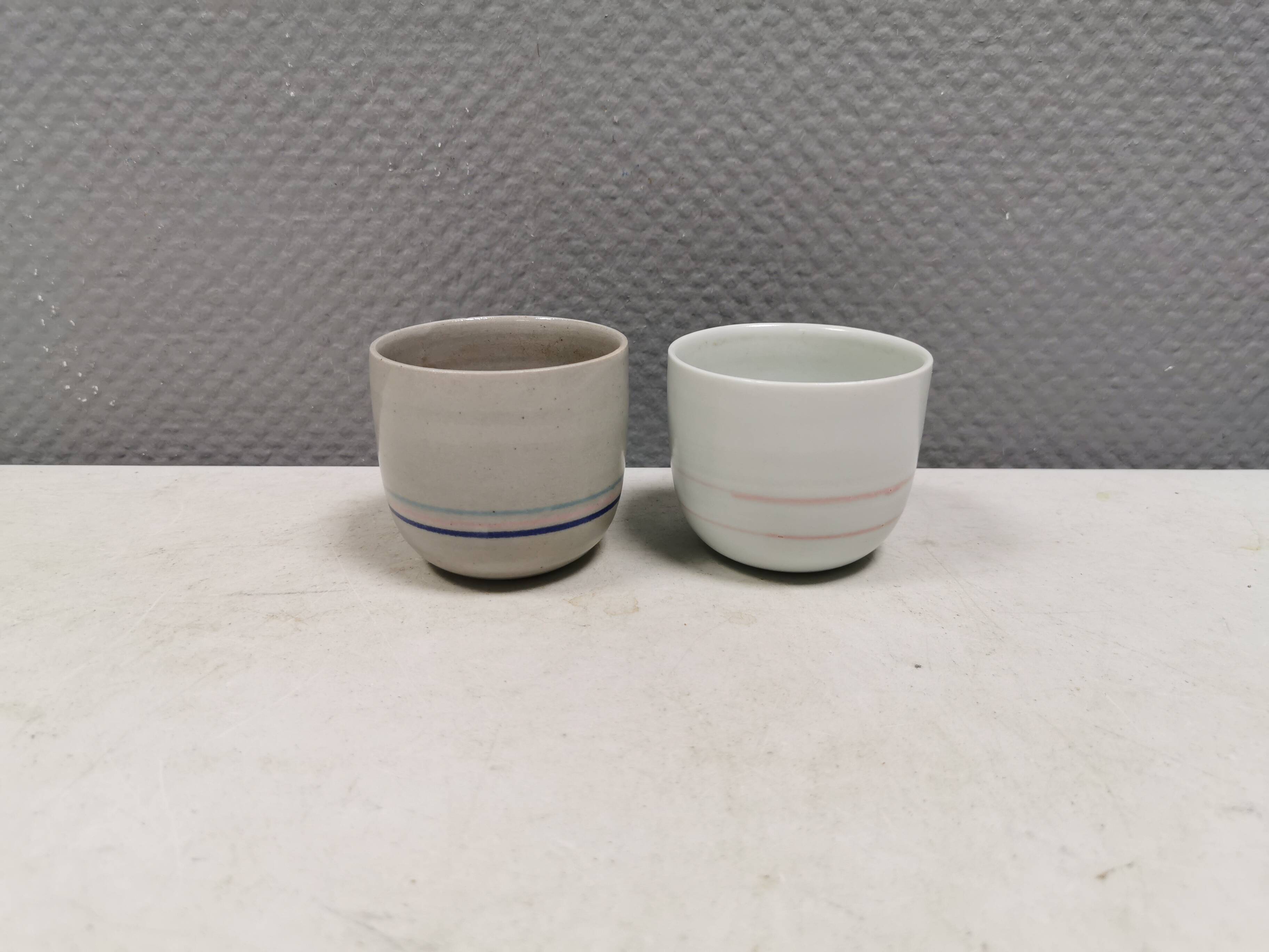 Two handmade ceramic mugs by Vibeke Fischer (VF) from the 1990s.