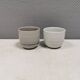 Two handmade ceramic mugs by Vibeke Fischer (VF) from the 1990s.