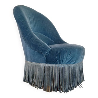 Blue velvet toad armchair with fringes