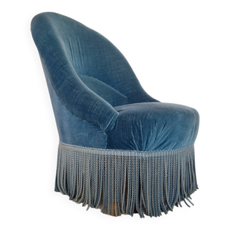 Fauteuil crapaud velours bleu avec franges