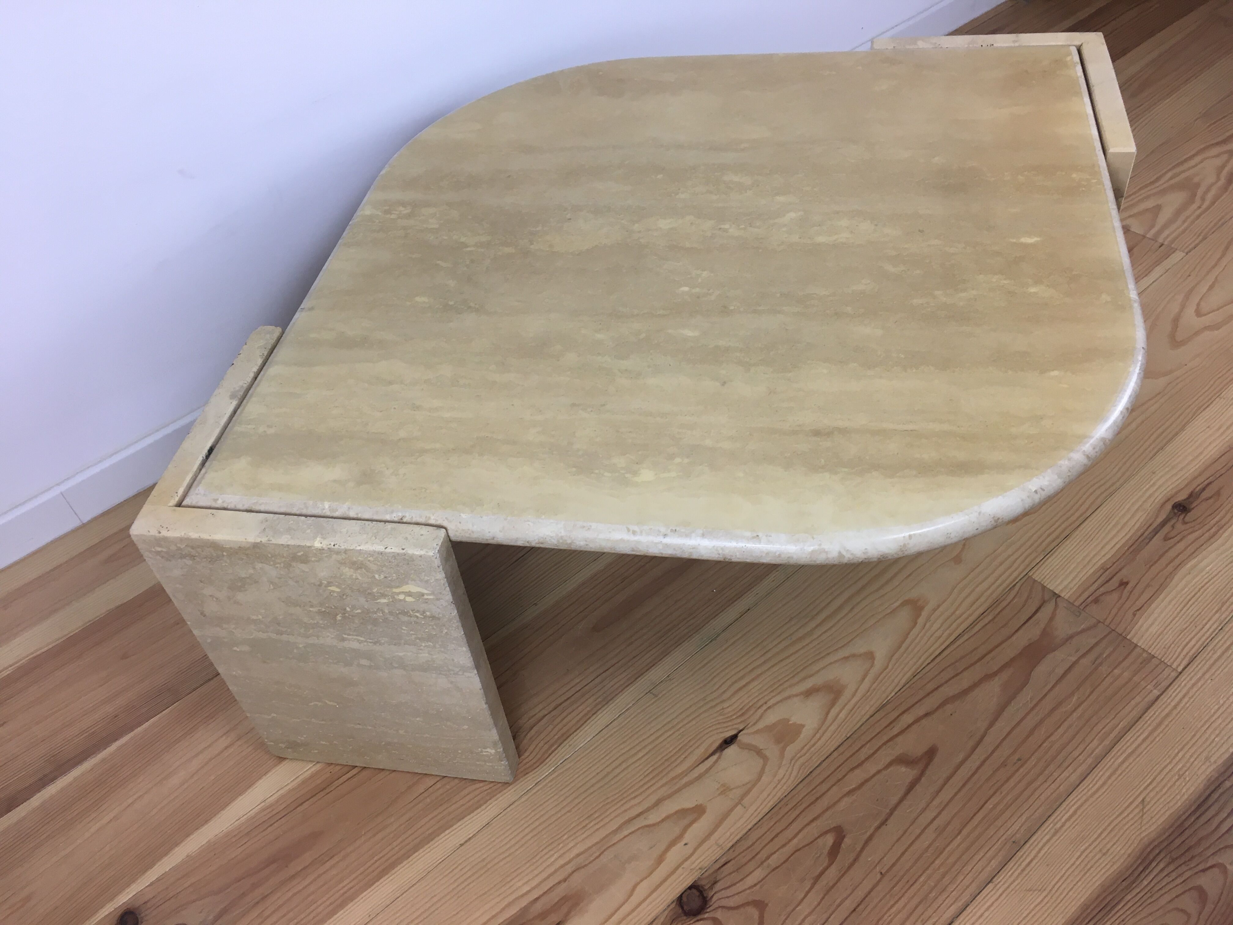 Bass table in travertine Roche Bobois