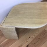 Bass table in travertine Roche Bobois