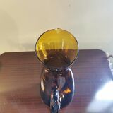 Vintage pitcher in amber glass