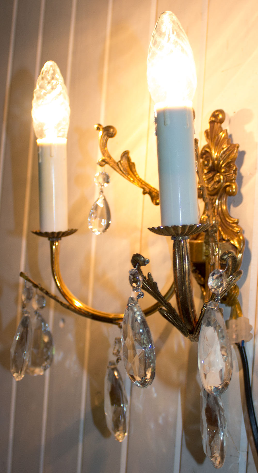 Old brass sconce with glass drops