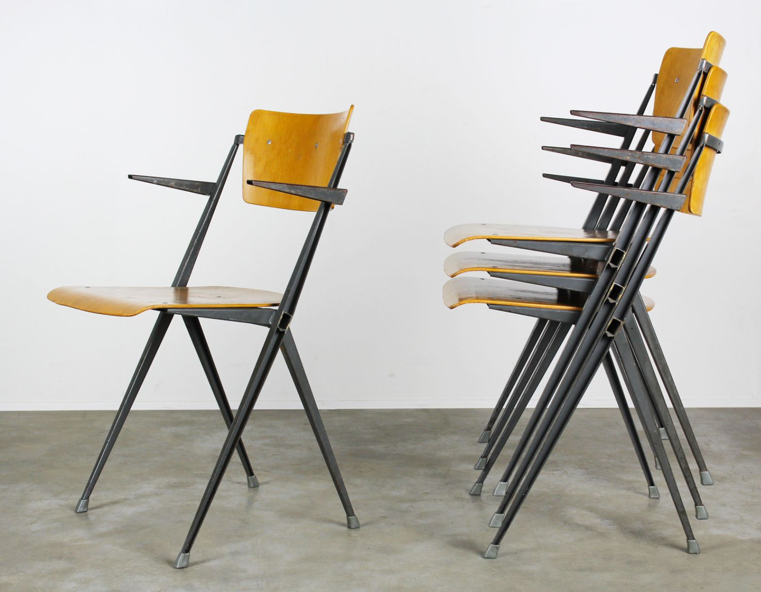 Vintage Pyramid chairs with armrests by Wim Rietveld