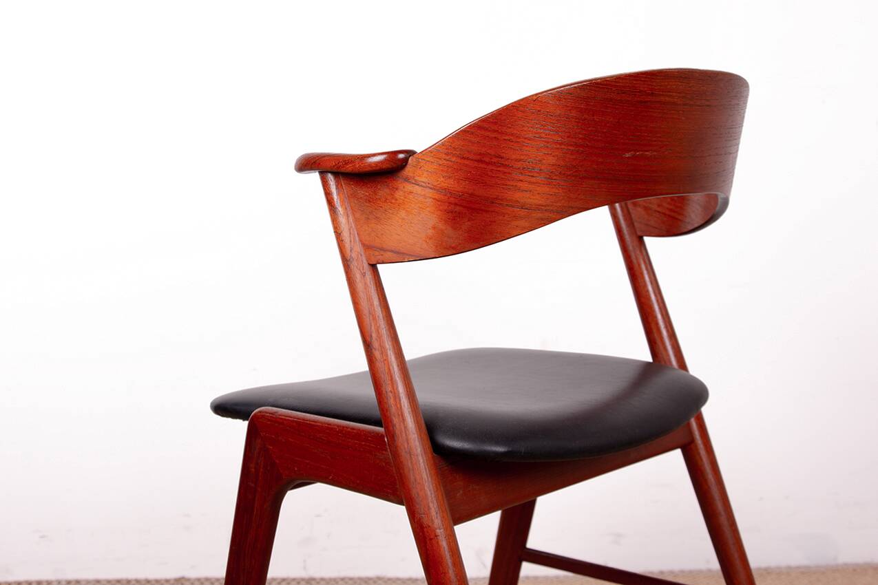 Danish armchair in teak and Skai, by Henning Kjaernulf for Korup Stolefabr.