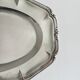 oval silver metal plate
