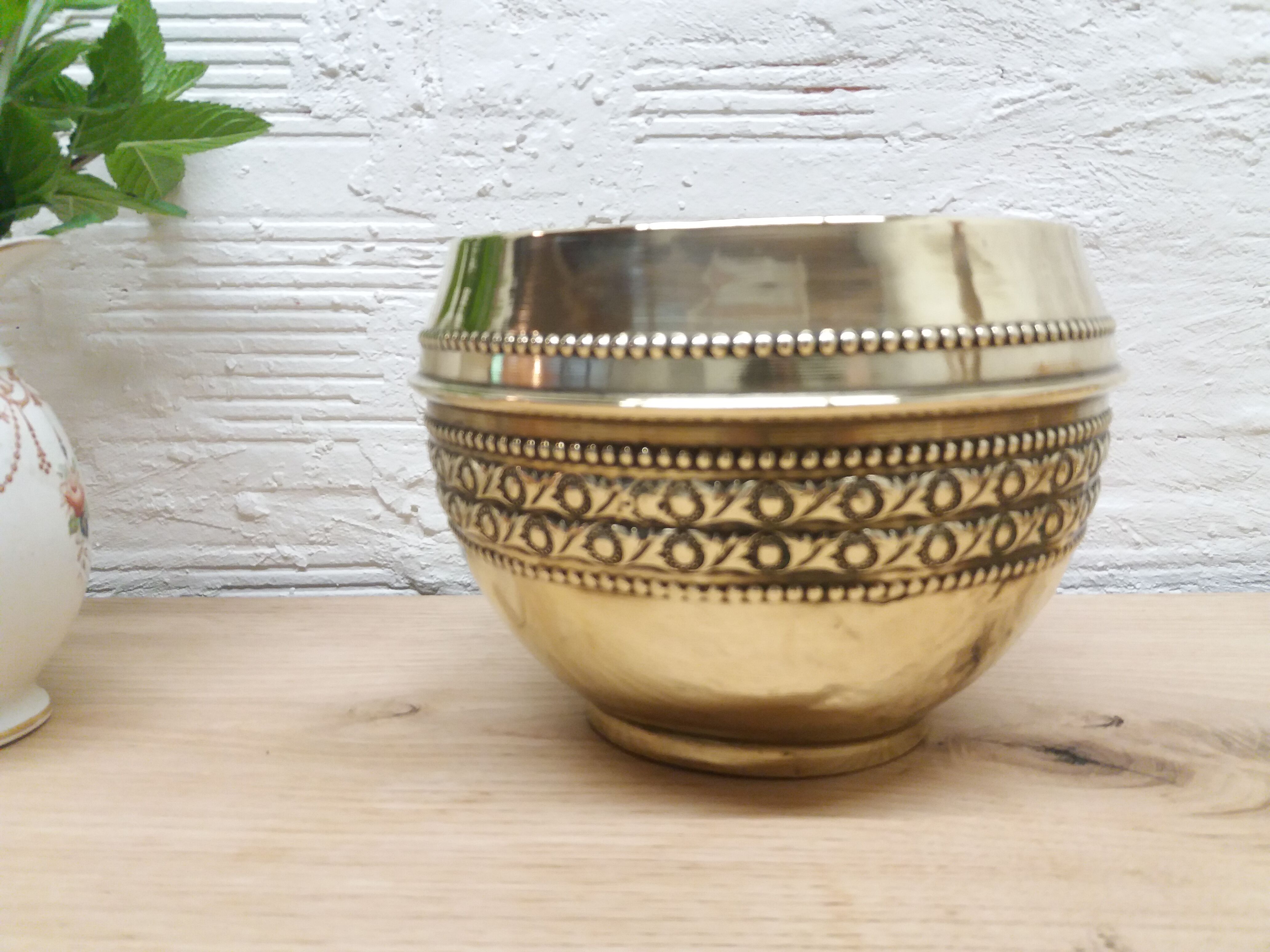 Golden brass pot cover