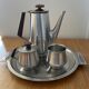 Vintage tea or coffee set in stainless steel and wood – signed Roger Insilco –