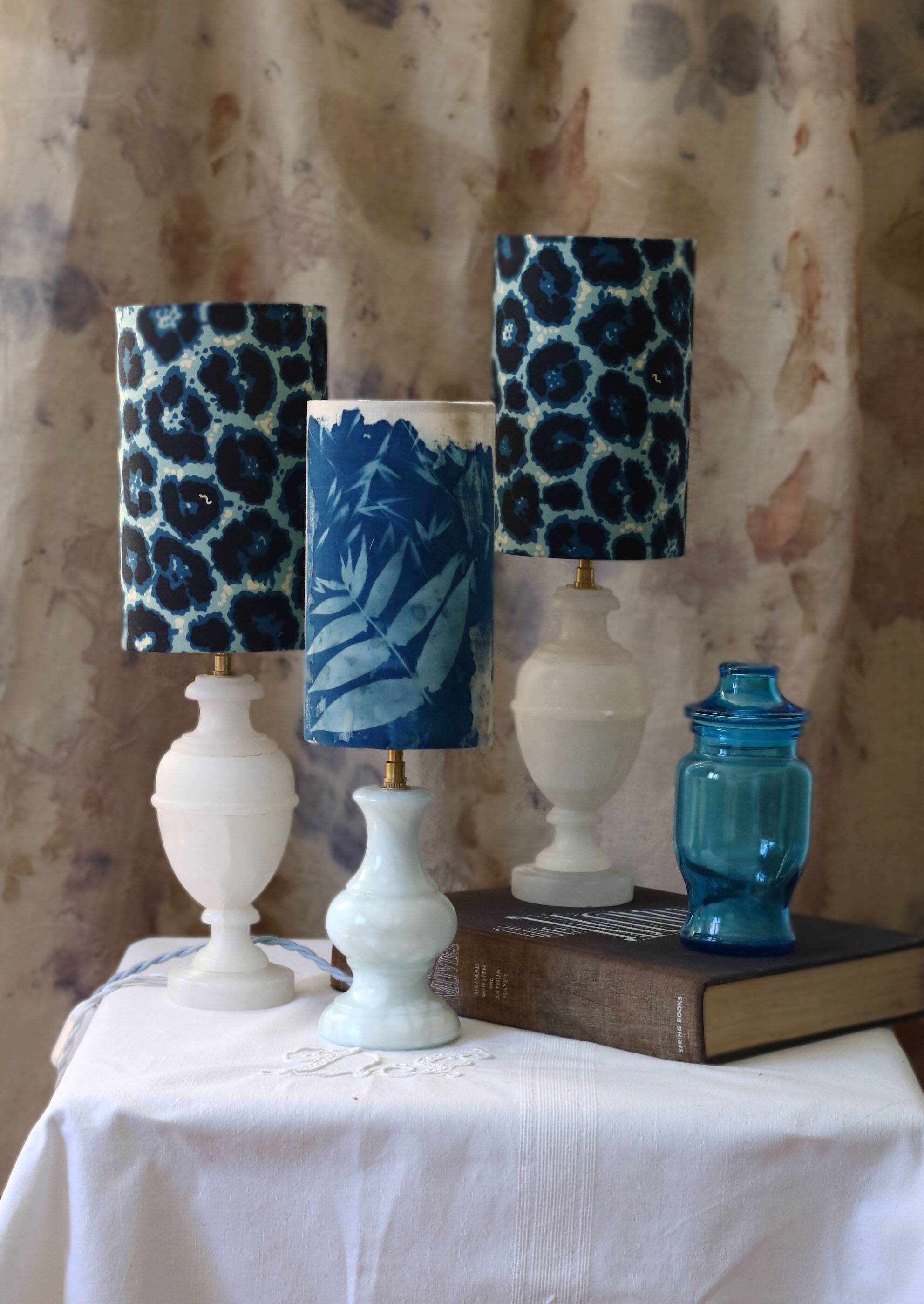 Pair of alabaster bedside lamps with blue leopard shades