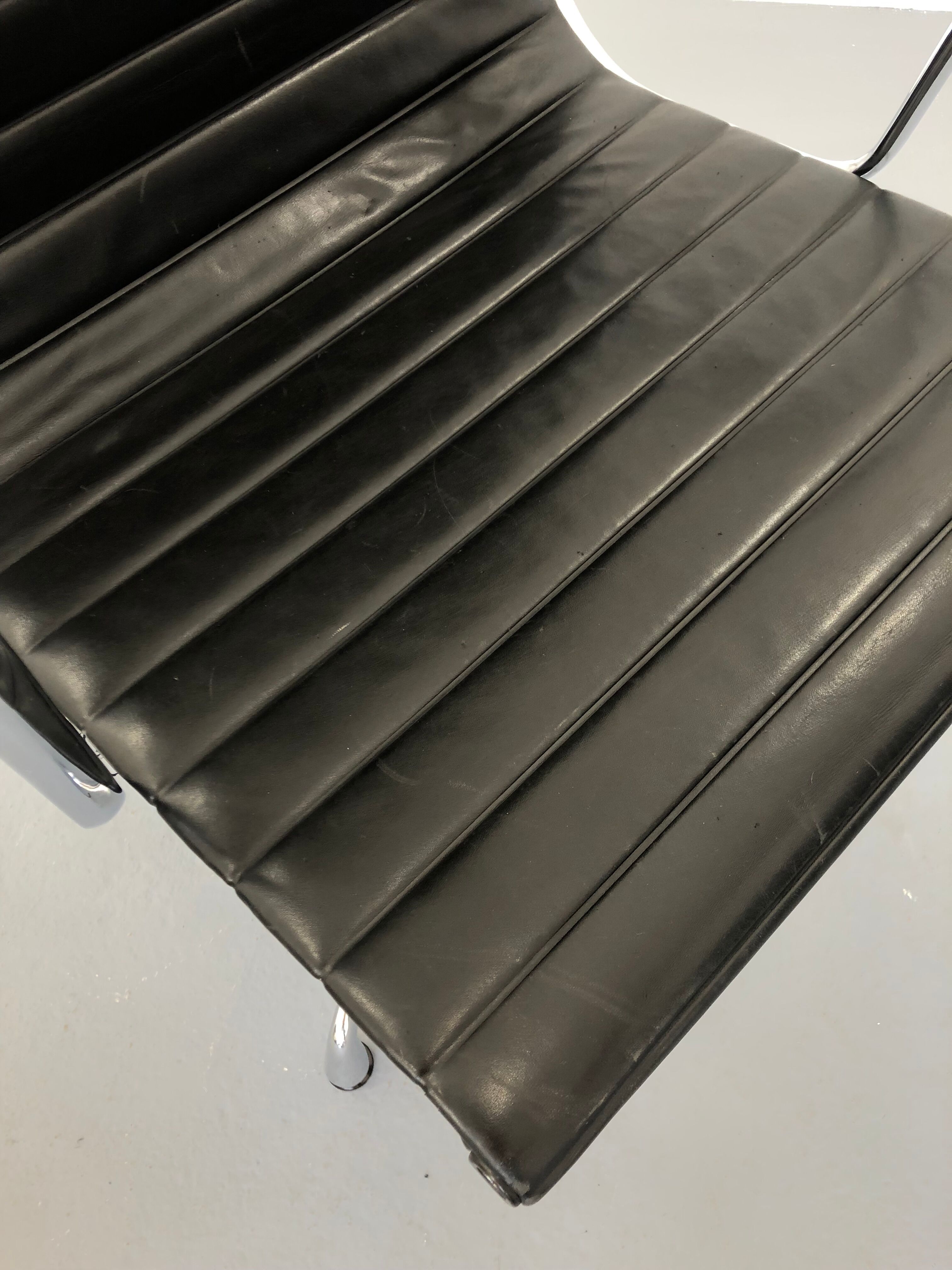 Black leather Ea-109 armchair by Charles Eames for Vitra