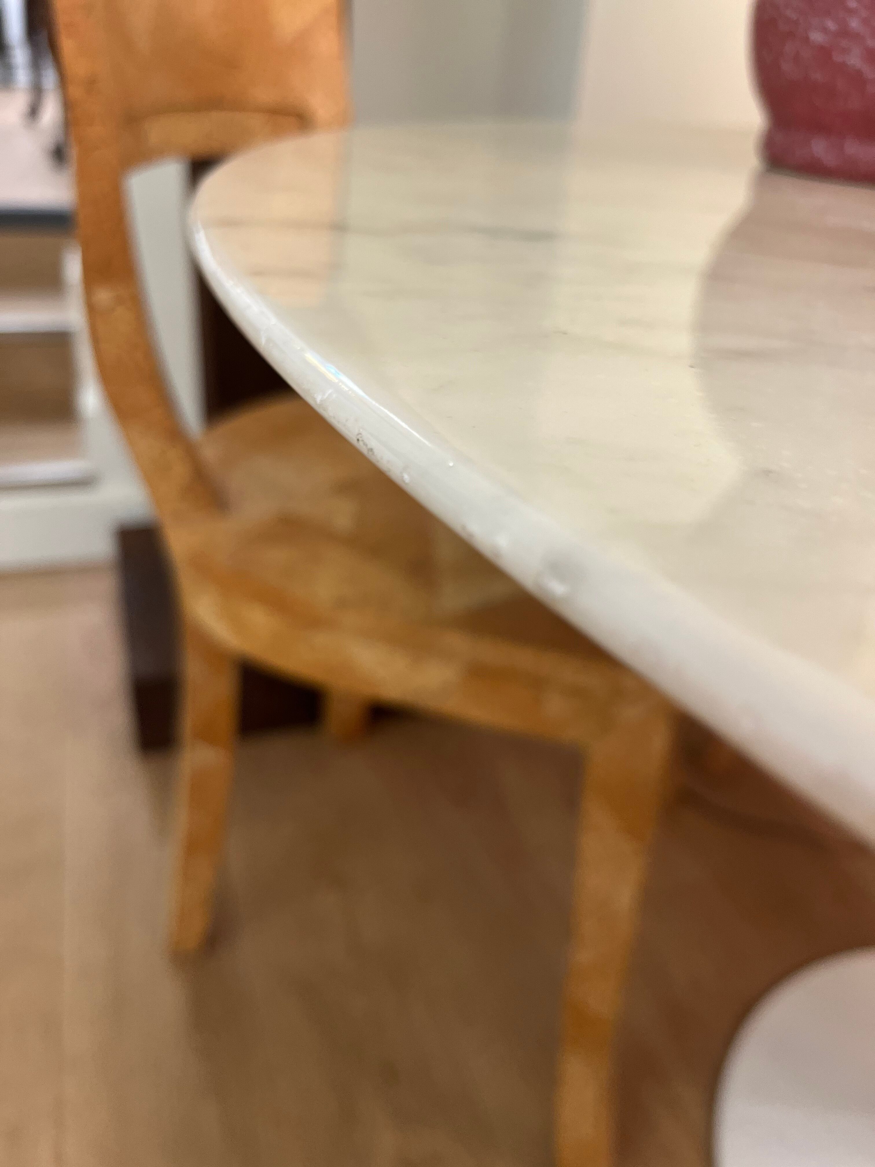 Marble round table by Ereo Saarinen , Knoll edition