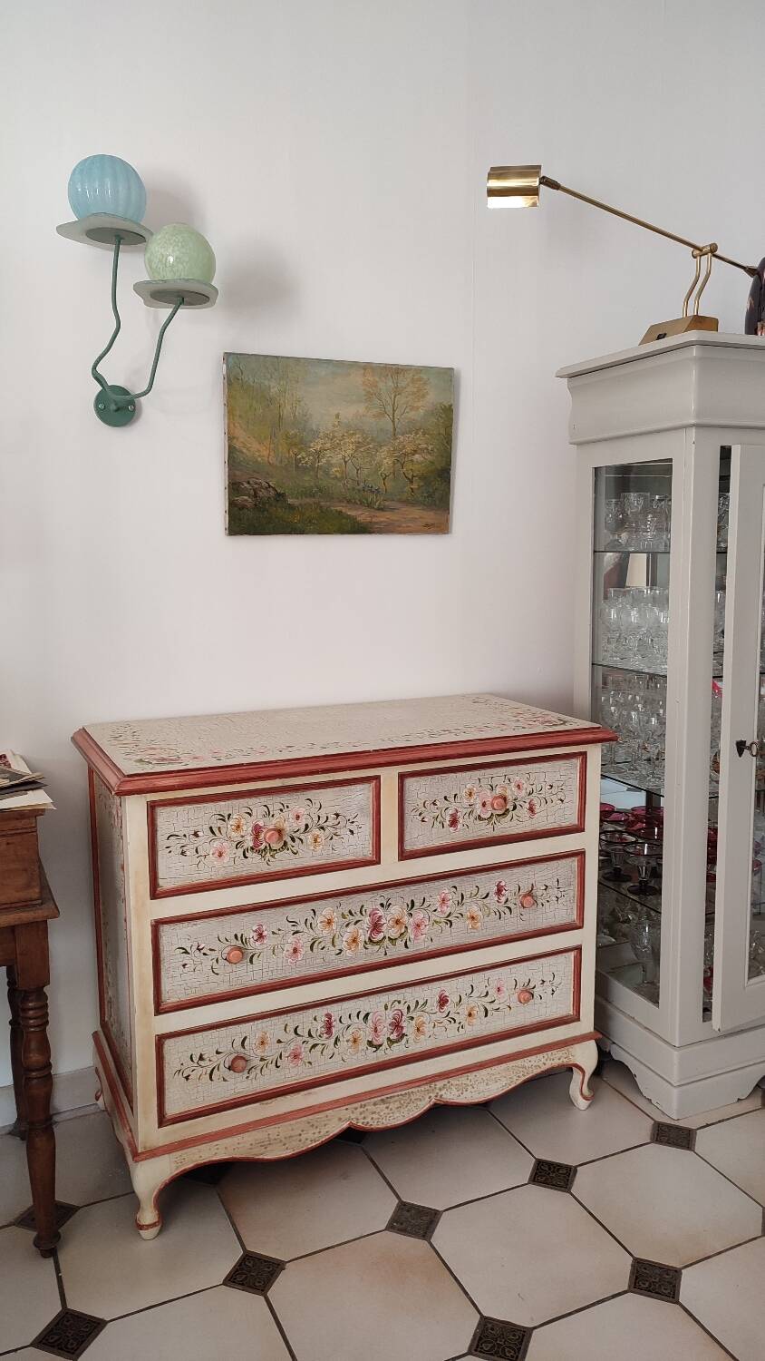 Painted chest of drawers with floral decoration