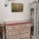 Painted chest of drawers with floral decoration