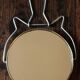 Antique round barber mirror in gilded metal