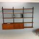Modular wall shelf in teak in mid-century modern style, designed by Poul Cadovius for Cado, 1960.