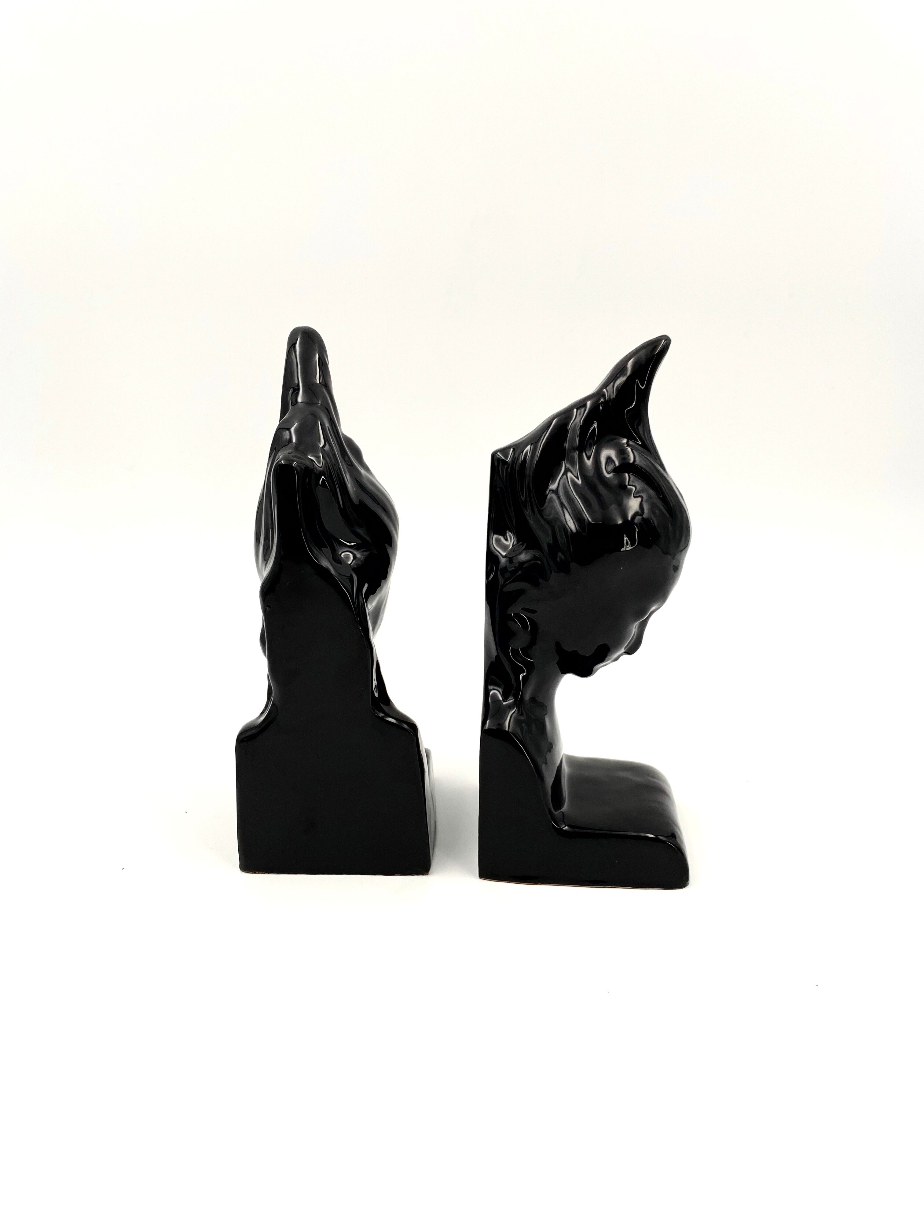 Angelo Minghetti, Art Déco black enamel Bookends, circa 1920, Signed