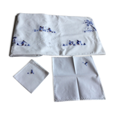 Exotic embroidered 100% cotton white background African embroidery in shades of blue 12 se