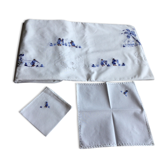 Exotic embroidered 100% cotton white background African embroidery in shades of blue 12 se