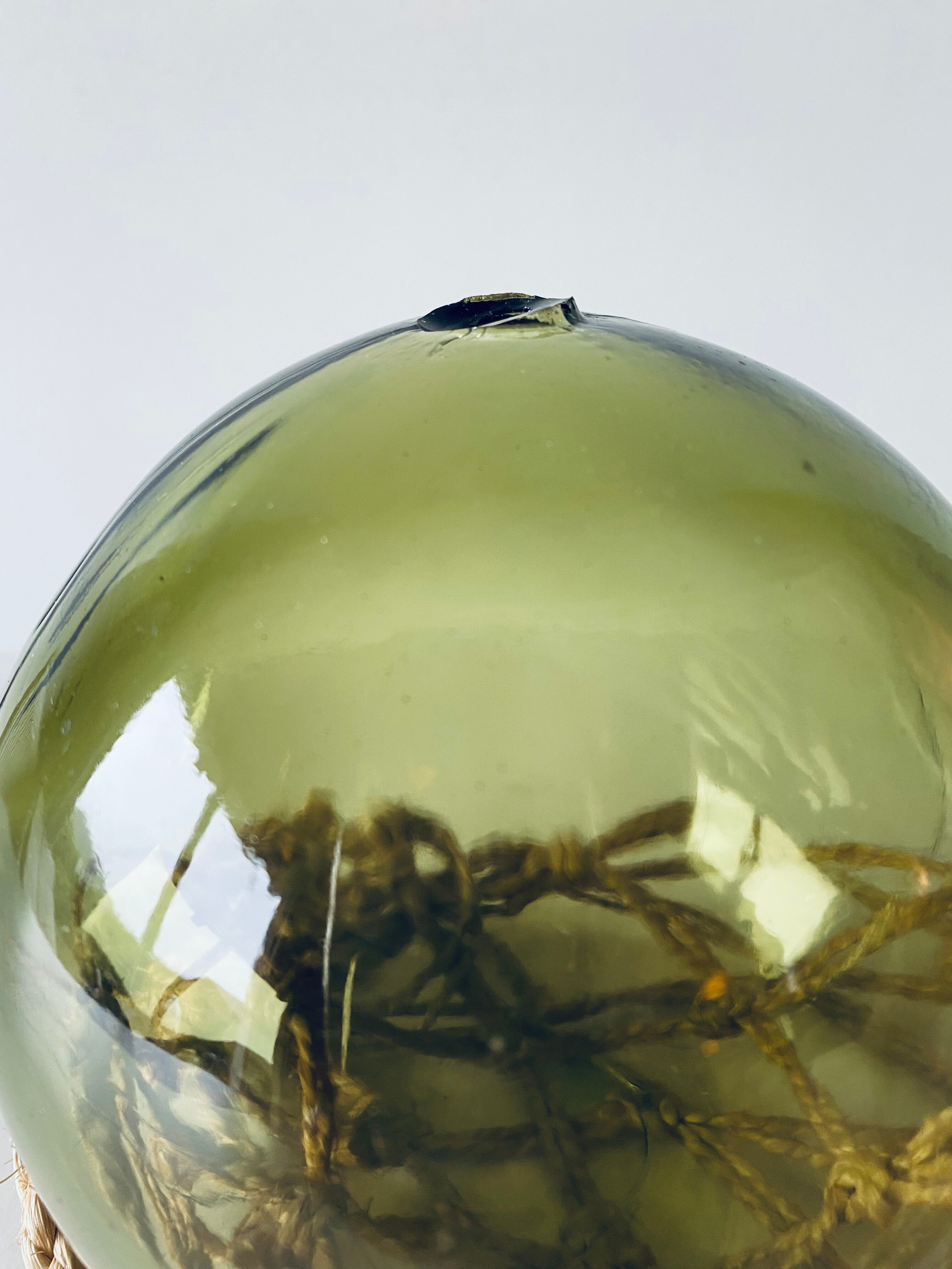 Old glass fishing float