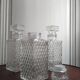 3 diamond-patterned chiseled glass carafes