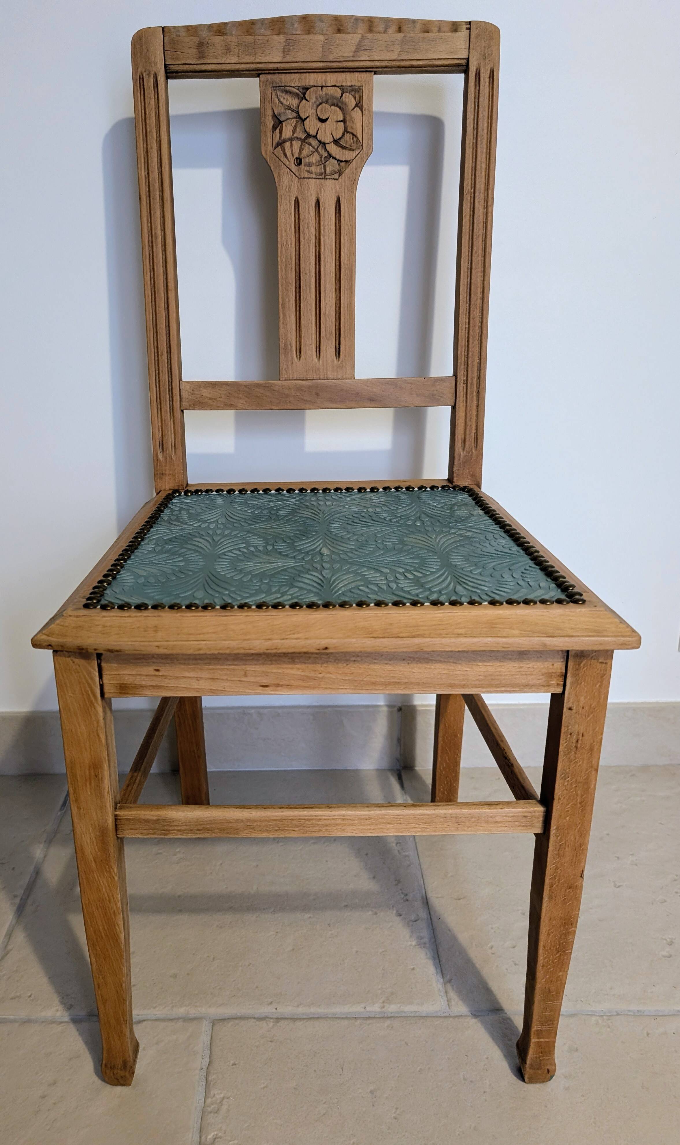 Revisited antique chair in solid wood with a sage green seat.