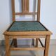 Revisited antique chair in solid wood with a sage green seat.