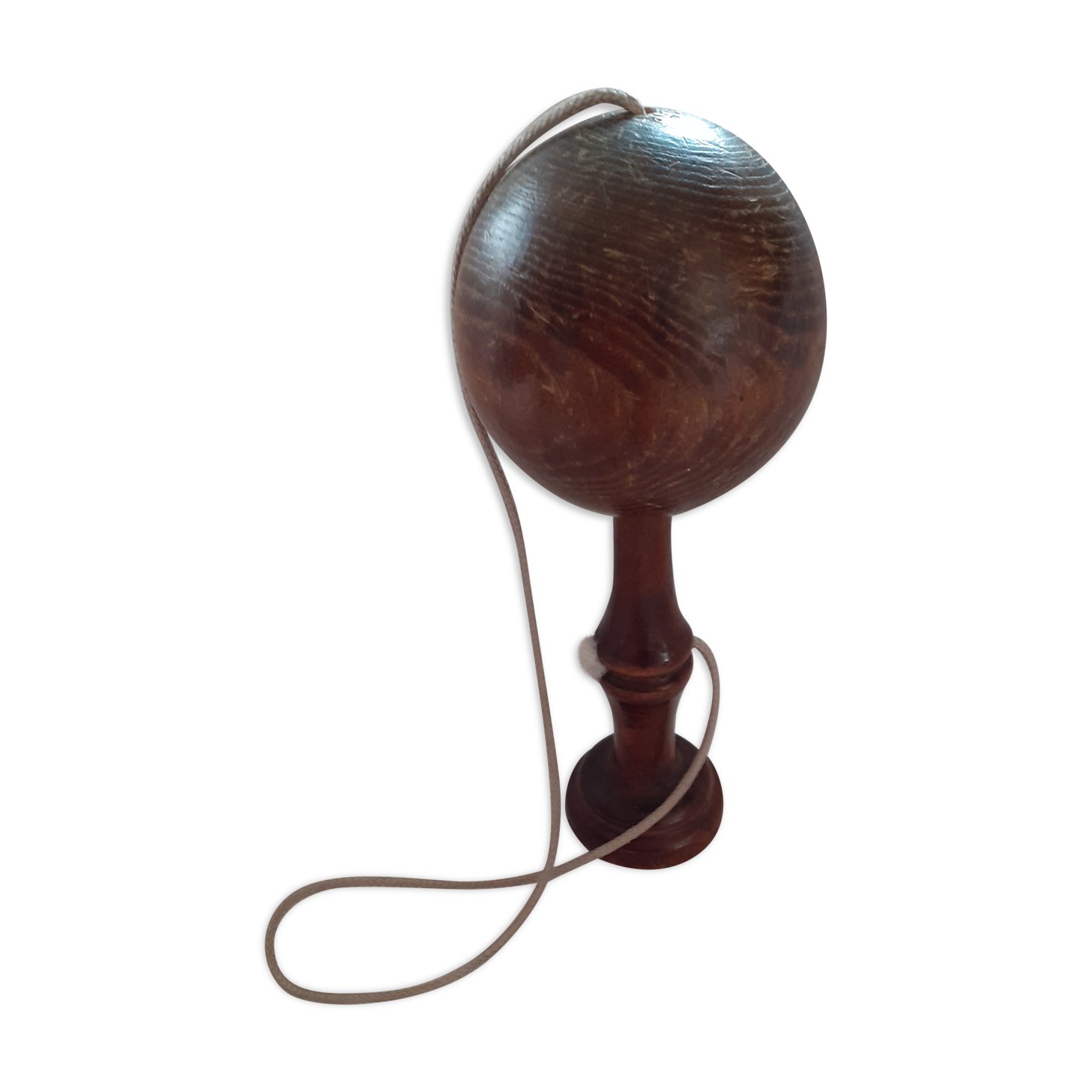 Old wooden bilboquet