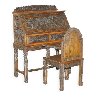 Chinese hand-carved desk from around 1940 with matching chair.
